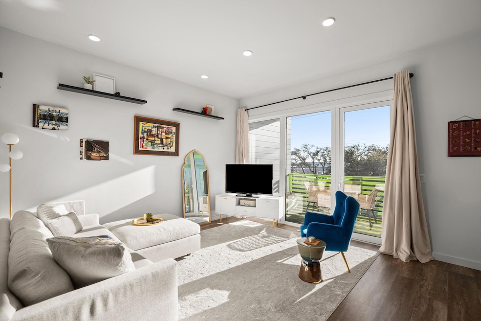 Living area with wood finished floors and recesse