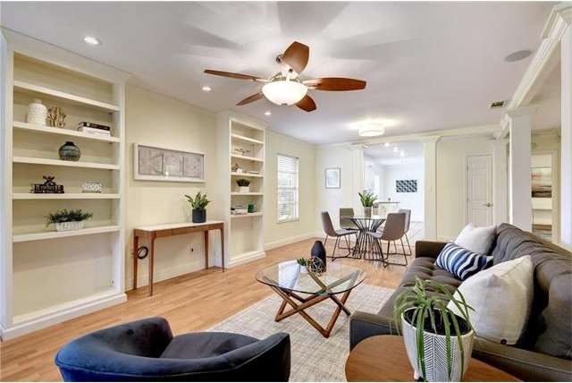 Sunny open-concept living area opens to the dining
