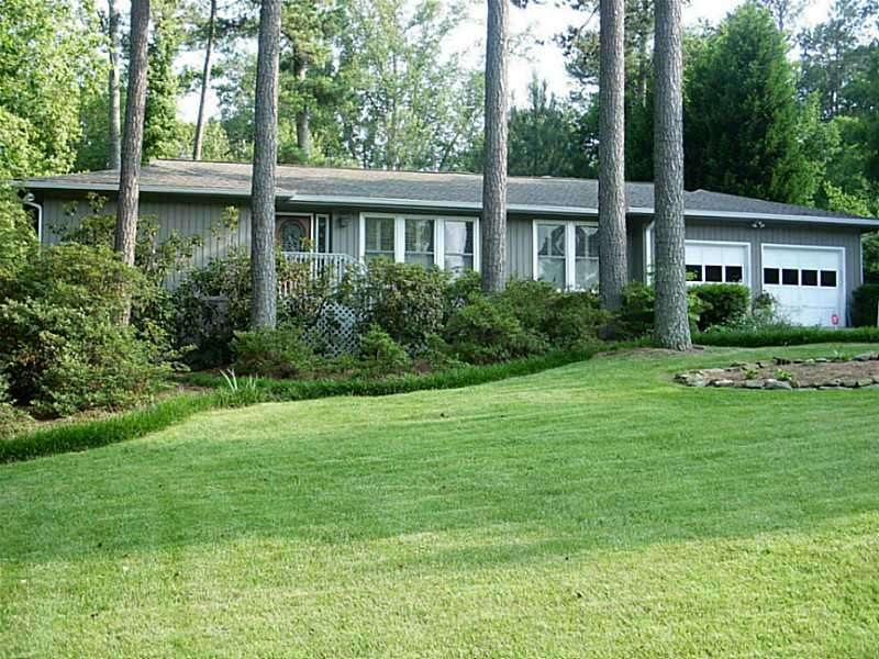 Exterior Front. The home is a traditional ranch on