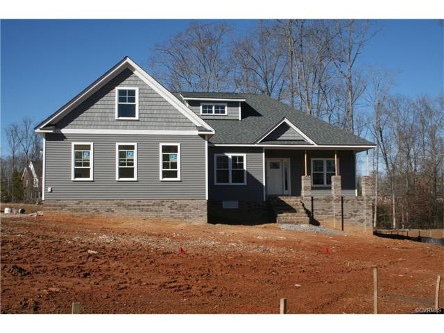 THIS FOUR BEDROOM RANCHER OFFERS THREE FULL BATHS,
