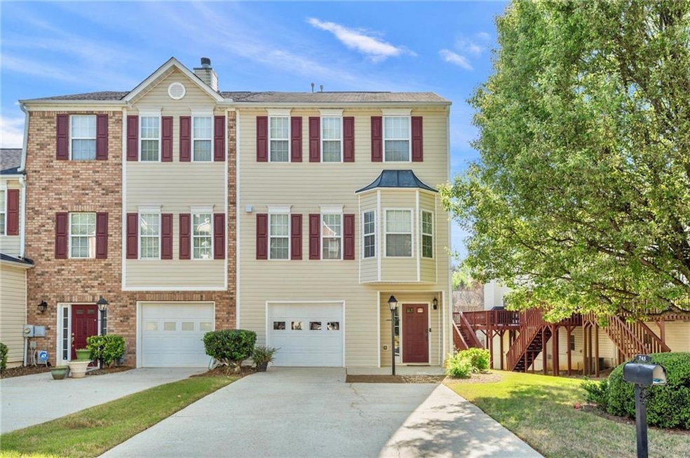 Townhome / multi-family property with an attached 