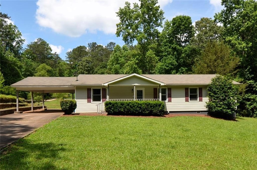 View of front of house featuring a front lawn and 