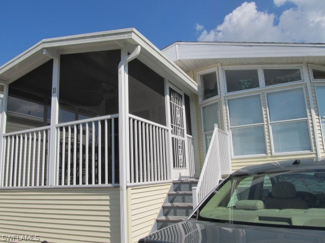 Screen porch at front of home