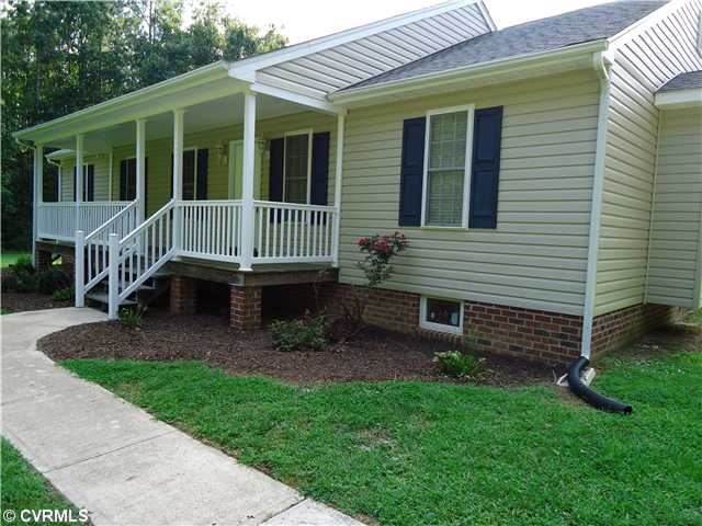 Exterior Front - 1610 sq ft living area plus 1600 