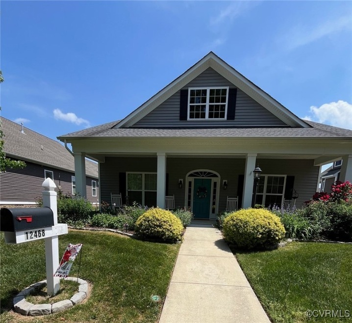 Bungalow-style home with a front lawn, dimensional