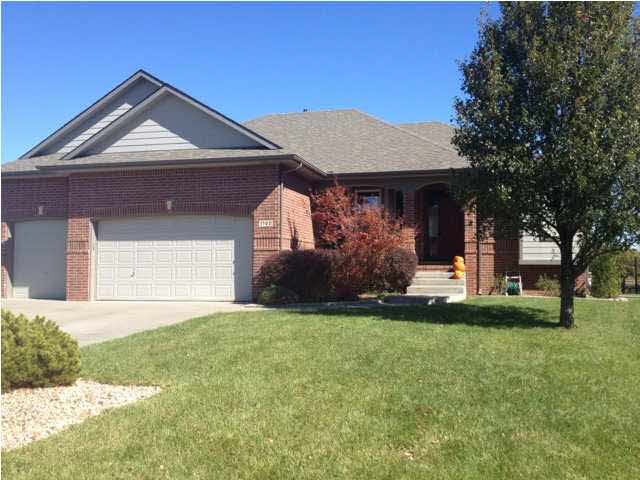 - Beautifully landscaped corner lakeview lot