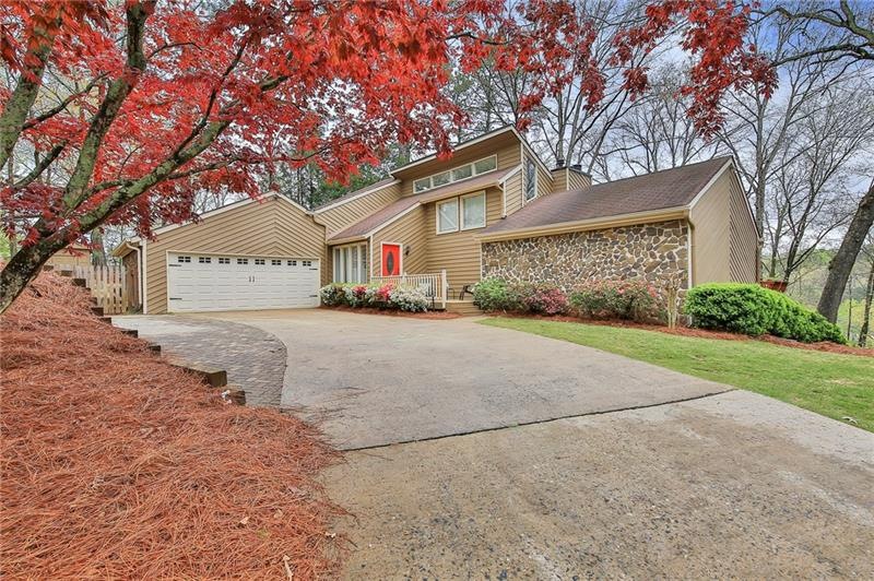 Great curb appeal with beautifully landscaped fron