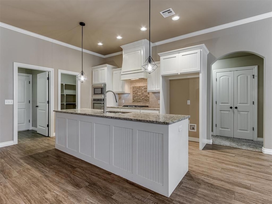 Kitchen featuring appliances with stainless steel 