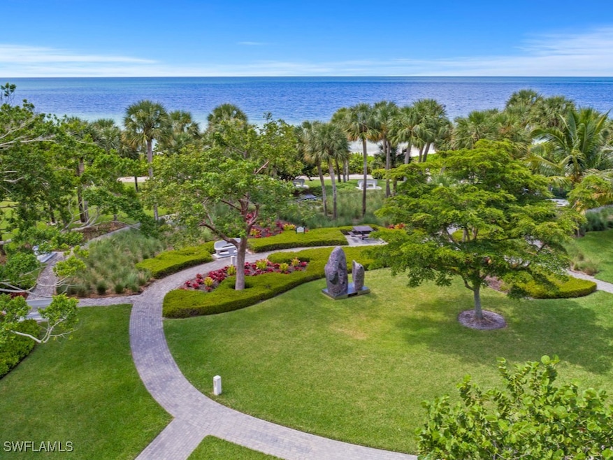 View of home's community with a water view and a y