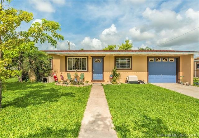 Cutler Bay Three Bedroom Home with a Fenced-In Lawn and One Car Garage