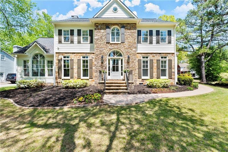 Hardscapes Feature Stacked Stone and Hardiplank Si