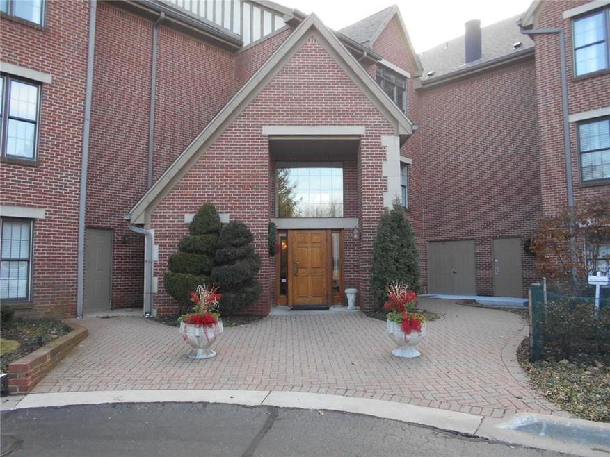 Main common entrance in rear parking lot