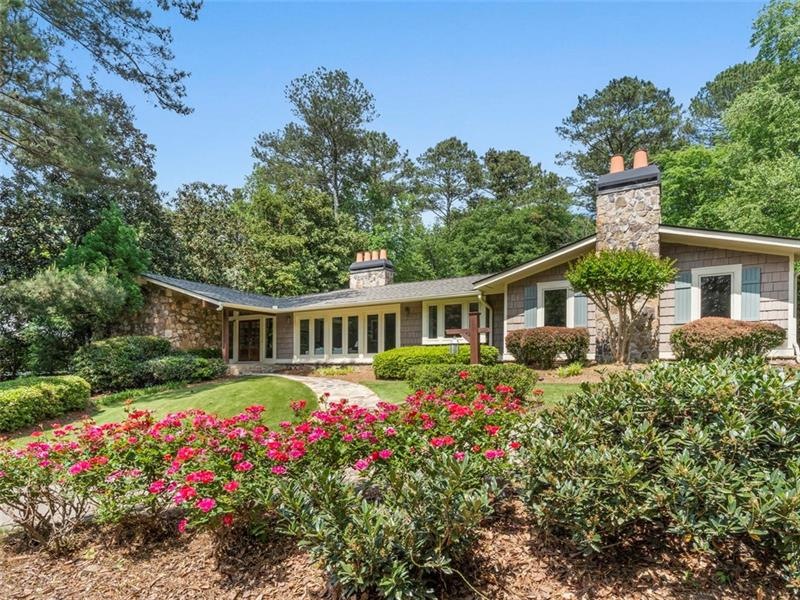 Mid Century and Craftsman style home in popular Ri