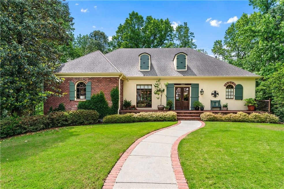 French country style house with french doors, a fr