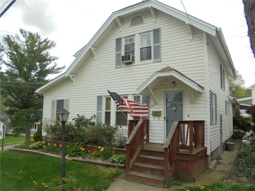 Vinyl siding and replacement windows.  View from H