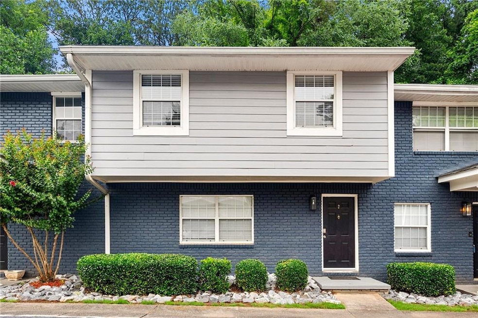 View of front of property with brick siding