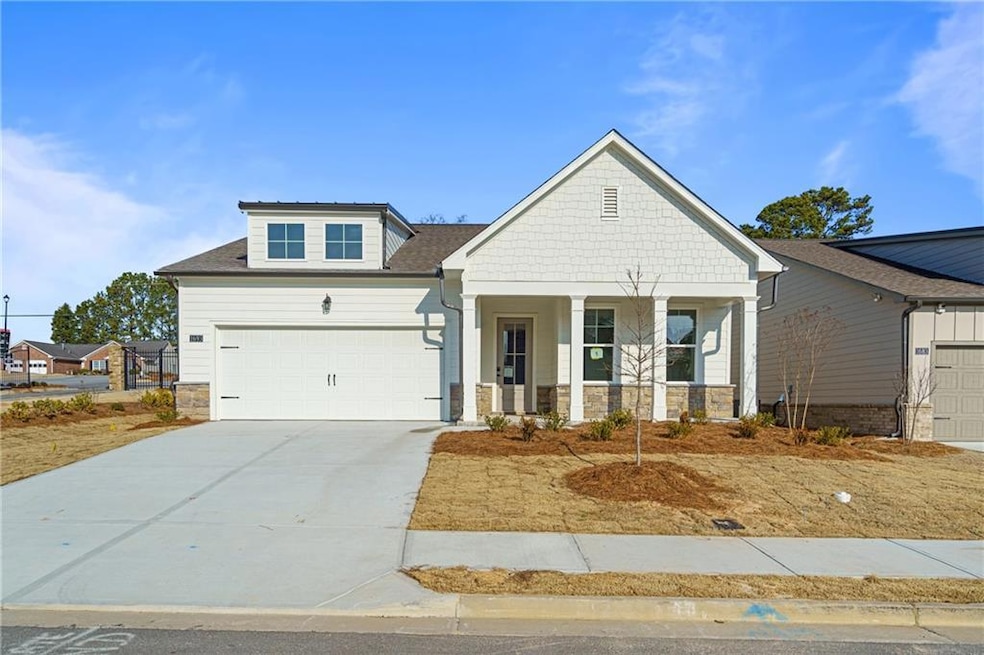 Craftsman house with a garage and covered porch*pi