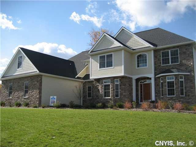 Exterior Front. Stone accented exterior with brick