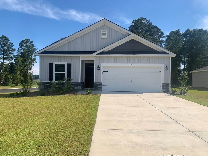 View of front of home featuring a front lawn