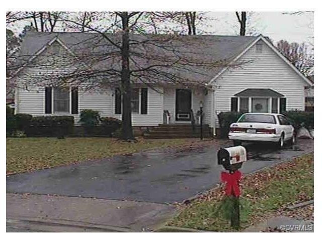 Maintenance free vinyl rancher with paved driveway