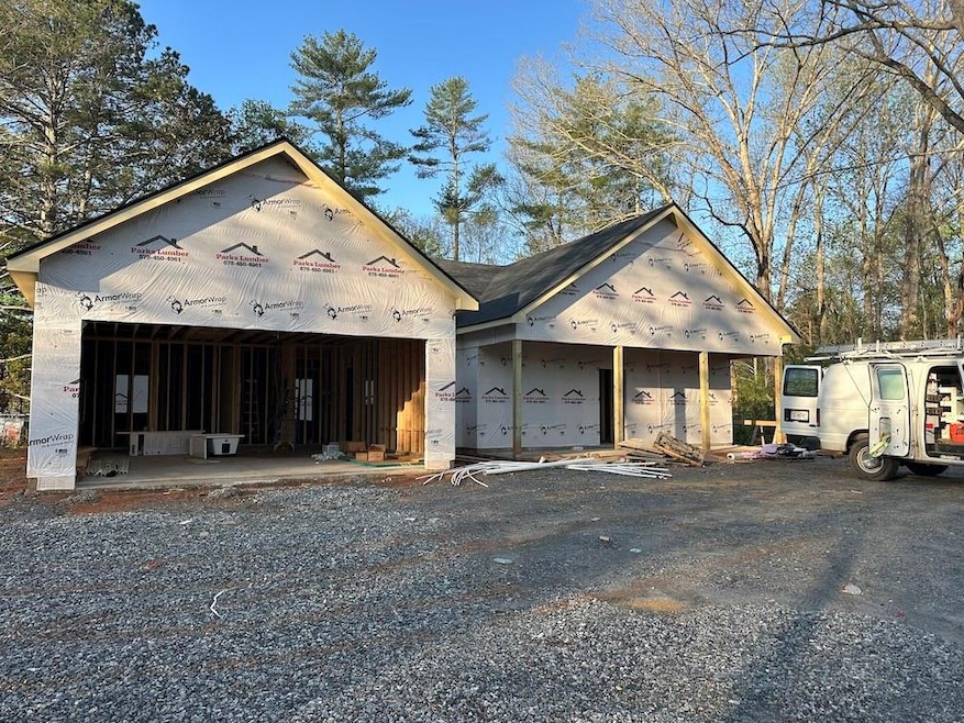 View of front of home featuring a garage