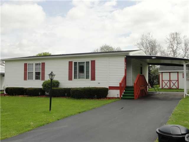 Exterior Front Front entry with carport and shed
