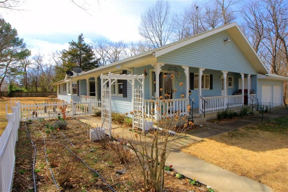 Beautiful Ranch style home completely remodeled inside and out, herb garden, park like setting