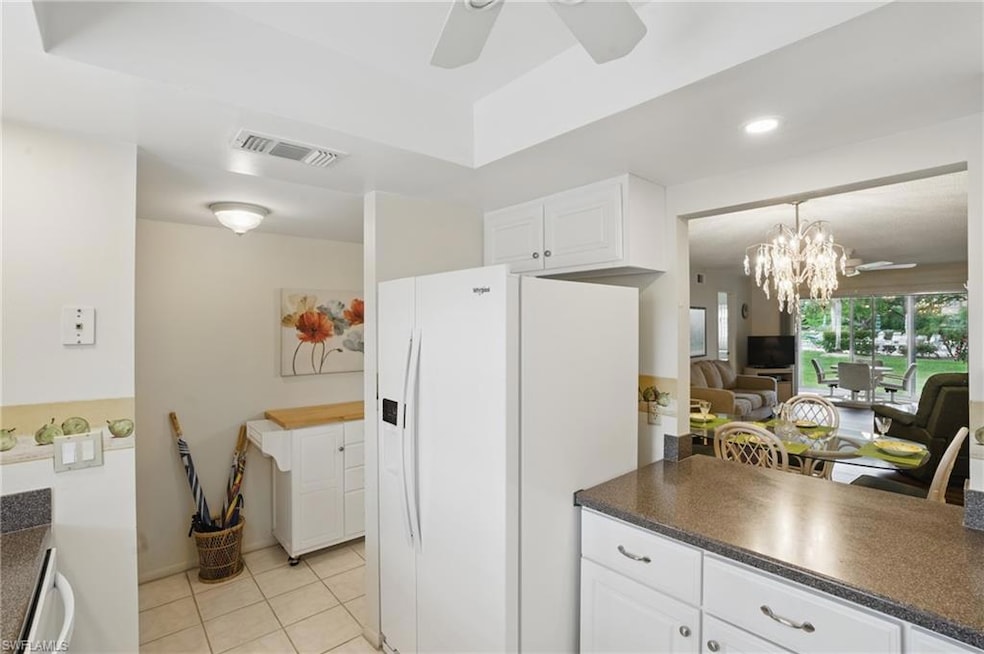 UPDATED KITCHEN...TRAYED CEILING WITH RECESSED LIG