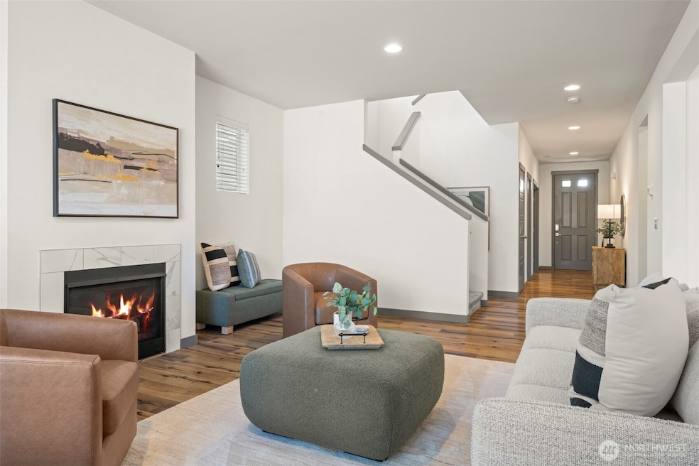 Bright and spacious great room with gas fireplace