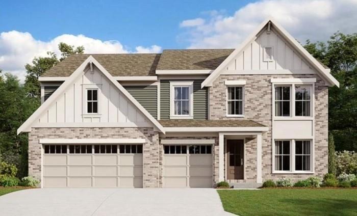 Modern inspired farmhouse with a garage and a fron