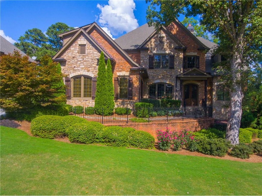 Welcome home to East Cobb elegance.  This peaceful