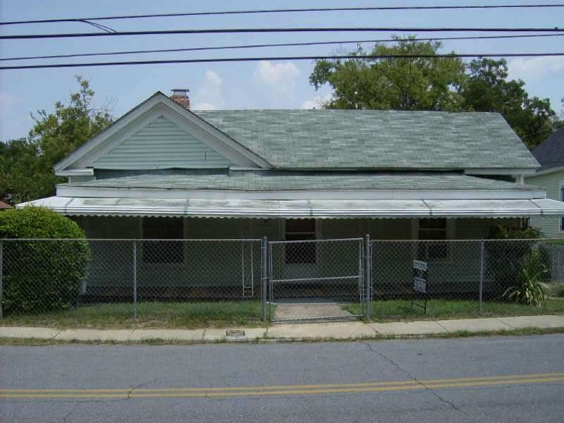 Exterior Front. FRONT OF HOUSE WITH GATE