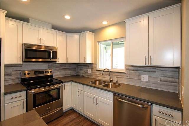 Brand new kitchen with Quartz Countertops and stai