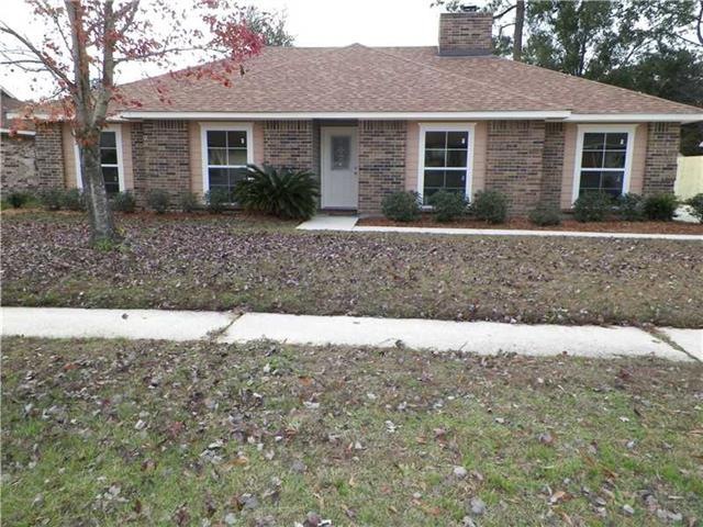 Facade/Exterior Front. Beautiful landscaping and a