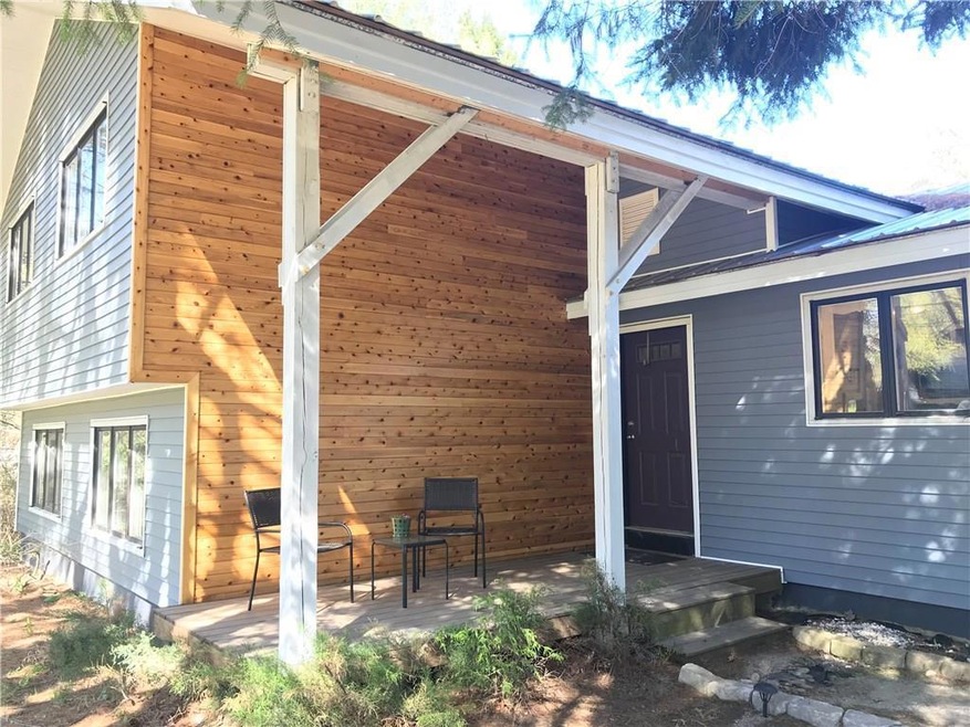 The cedar wall makes this entry pop!