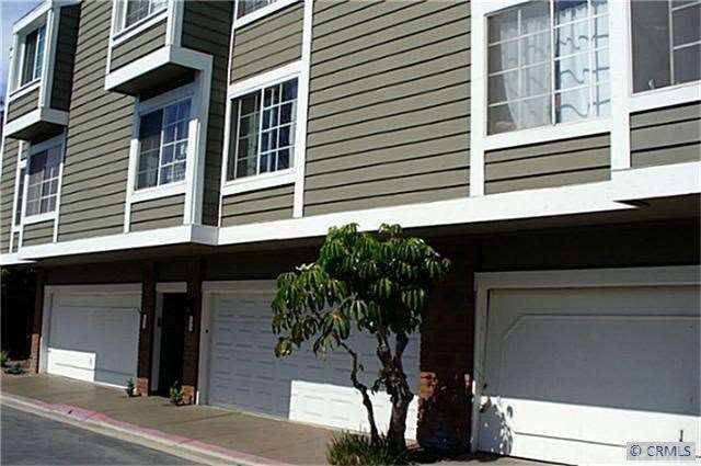 CONDO HAS ITS OWN 2-CAR GARAGE WITH WORKBENCH