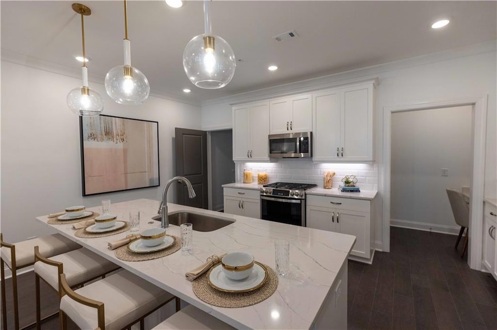 Model Home. The Avery plan has a stunning kitchen 