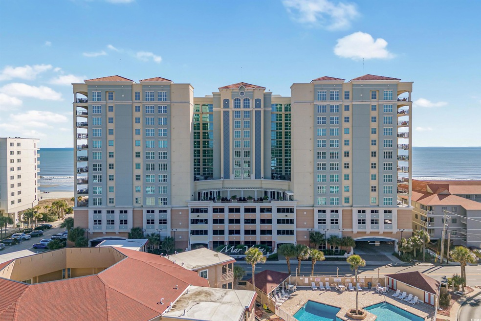 View of building exterior featuring a water view