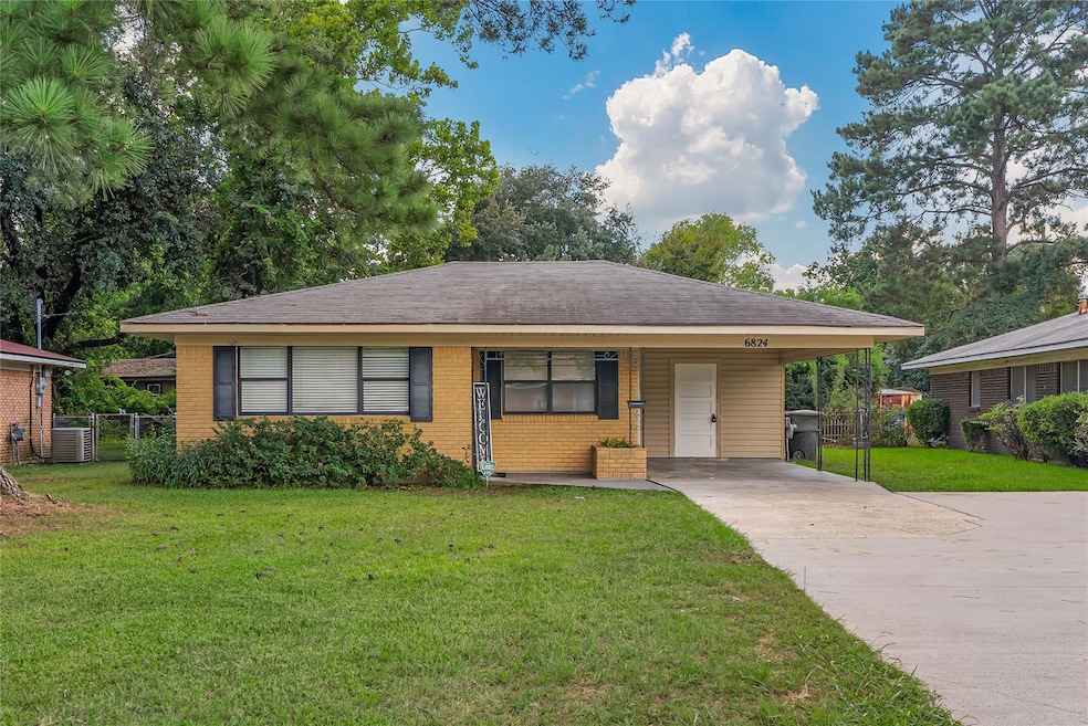 Ranch-style home with a front yard, central AC, an
