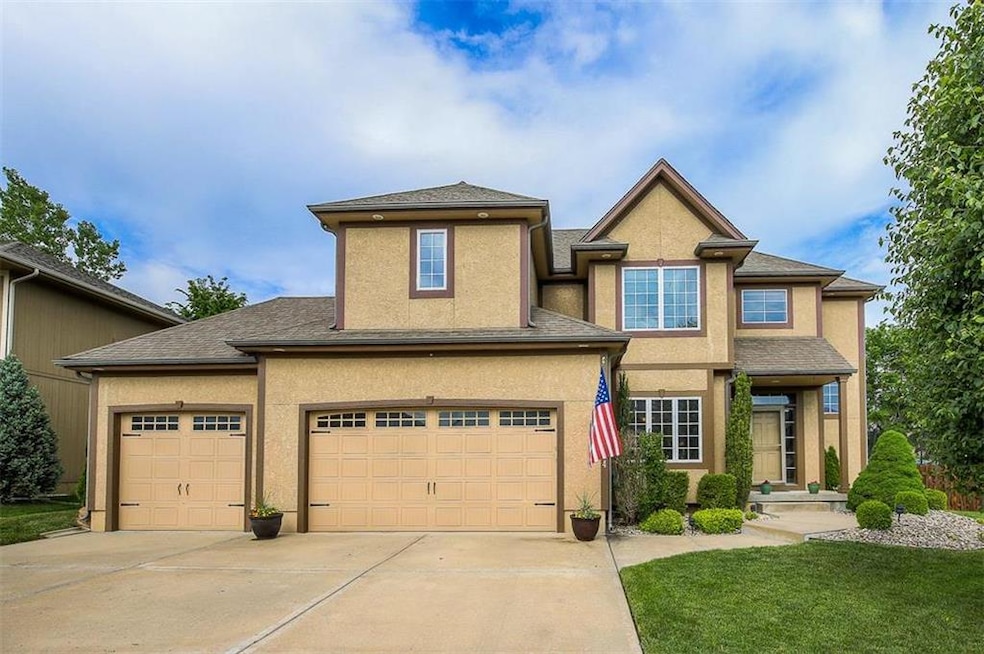 BEAUTIFUL CURB APPEAL WITH LUSH LANDSCAPE!