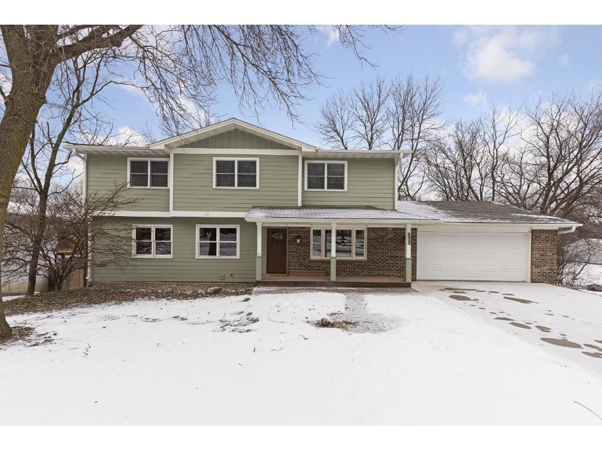 5 bedroom, 4 bath and 3+ garage stalls on one acre