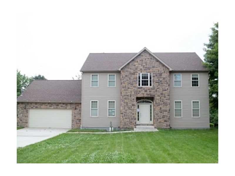 Exterior Front. TWO STORY COLONIAL WITH A TWO ATTA
