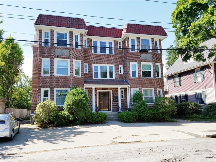 Exterior of building. Unit for sale is on the seco