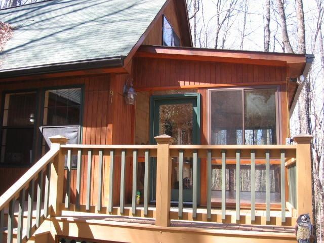 Entrance from driveway onto decks and into Sun Roo