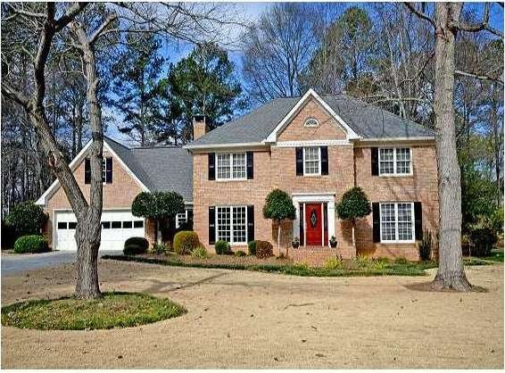 Exterior Front. Renovated Brick Traditional on Lar