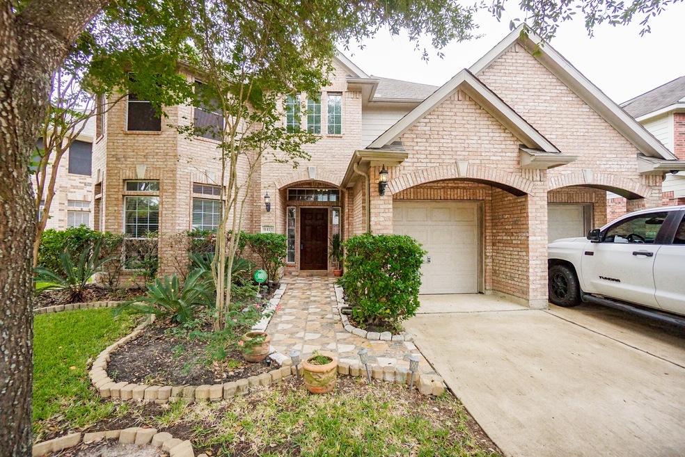 9411 Langley Springs Dr, Houston, TX 77095 - photo 1
