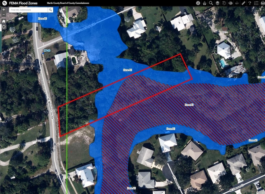 4975 SE Manatee Cove Rd, Port Salerno, FL 34997 - photo 1