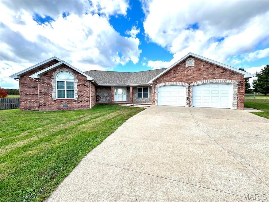 Single story home with brick siding, concrete driveway, an attached garage, a shingled roof, and crawl space
