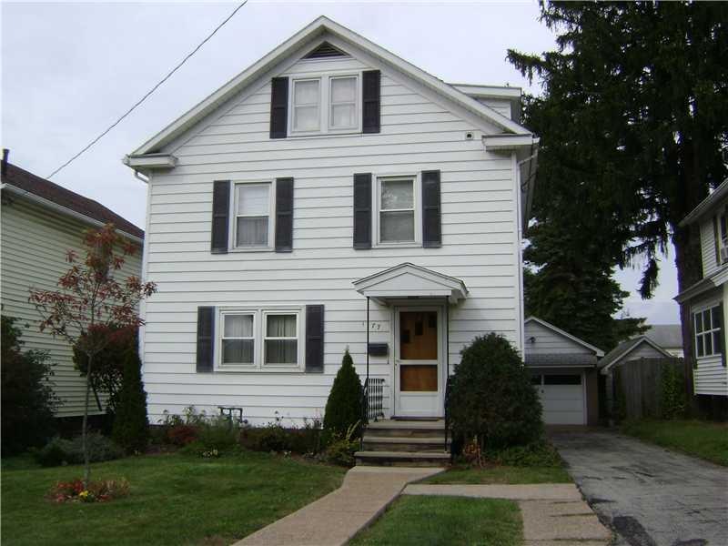 Exterior Front. Nicely landscaped with easy care.