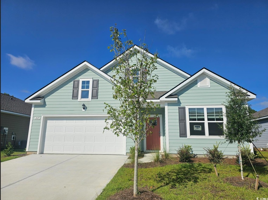 Ranch-style house featuring driveway